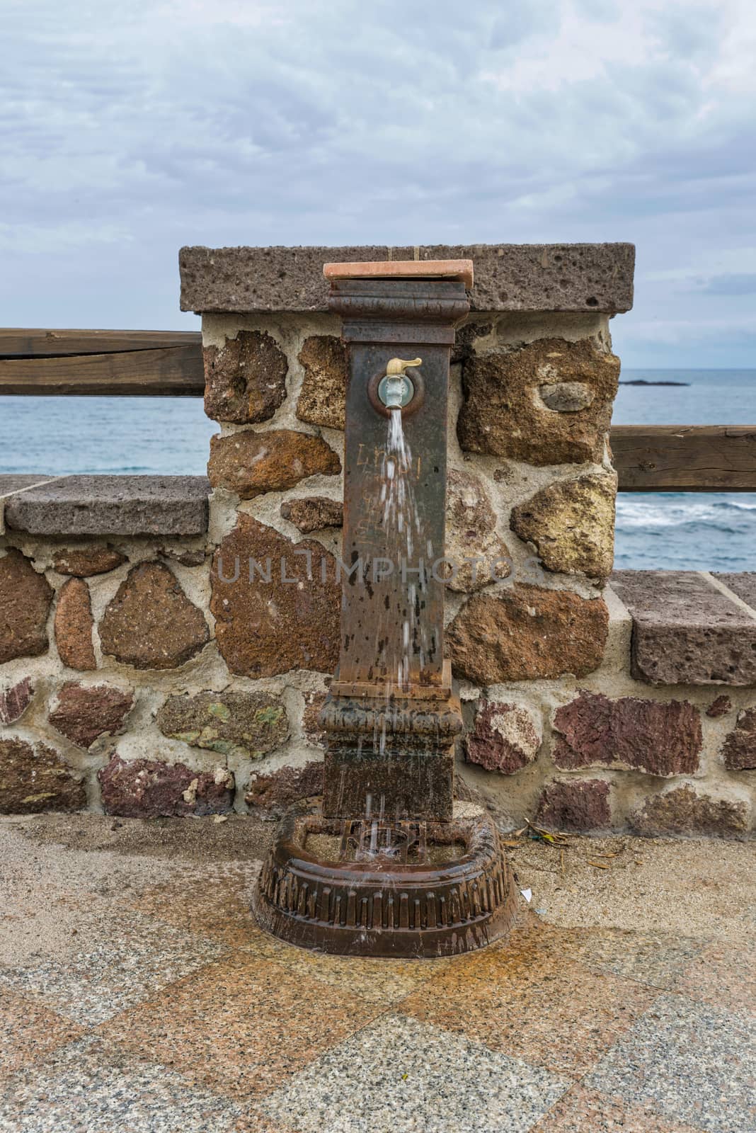 public tap with drinking water in castelsardo on the italian island of sardinia