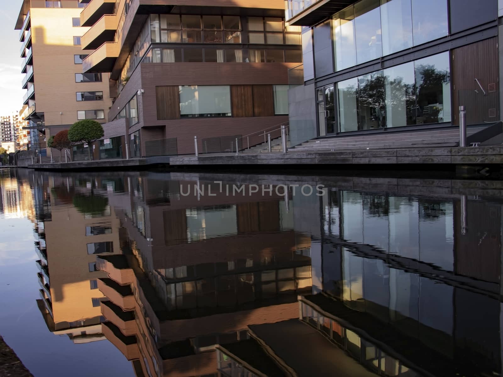 Reflection on a few building in the water of the canal