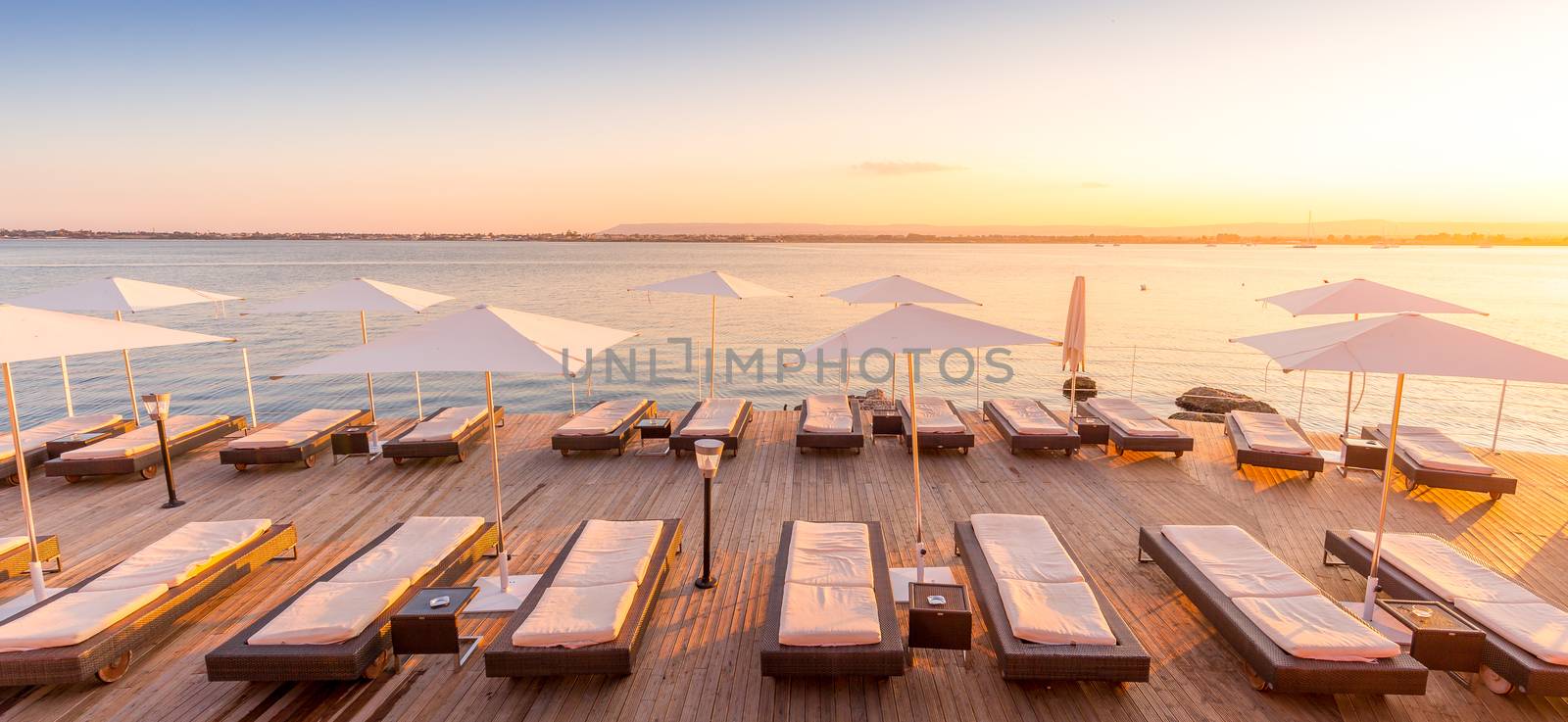 Syracuse, Isle of Sicily, Italy. Sunset in front of the sea at the end of a spring day in May.