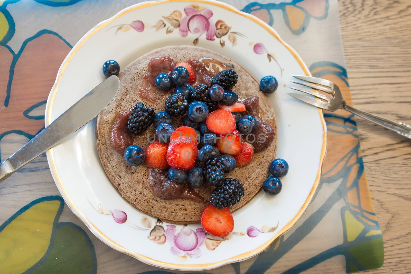 Pancakes with blueberries, blackberries and strawberries by ben44