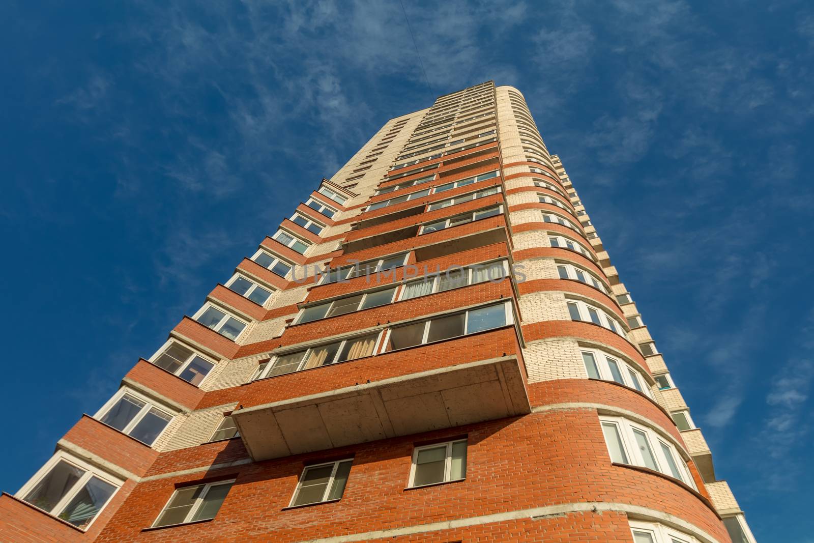 Modern building exterior low angle view with blue sky