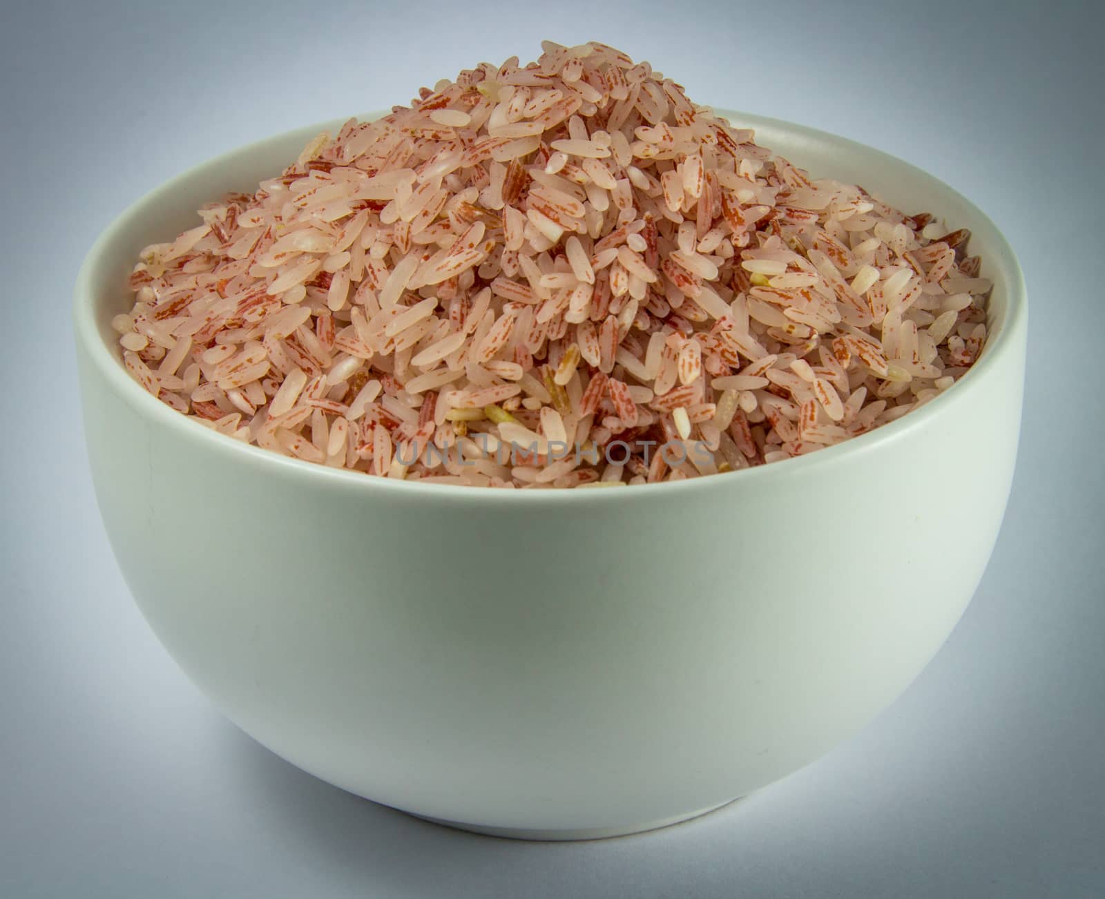 brown rice by peerapixs