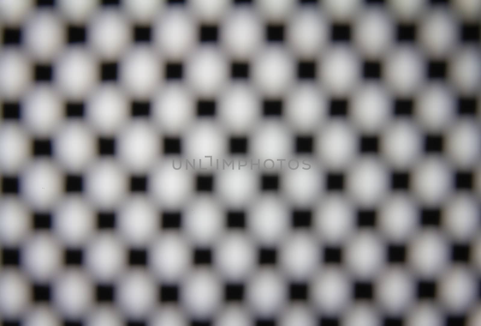 The squre dot grid with Blur focus by peerapixs