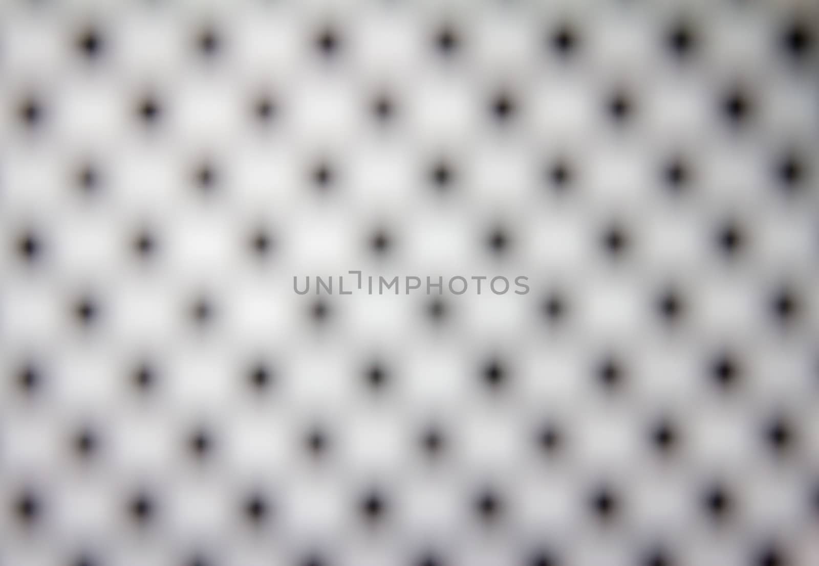The Blur dot grid background of black and white