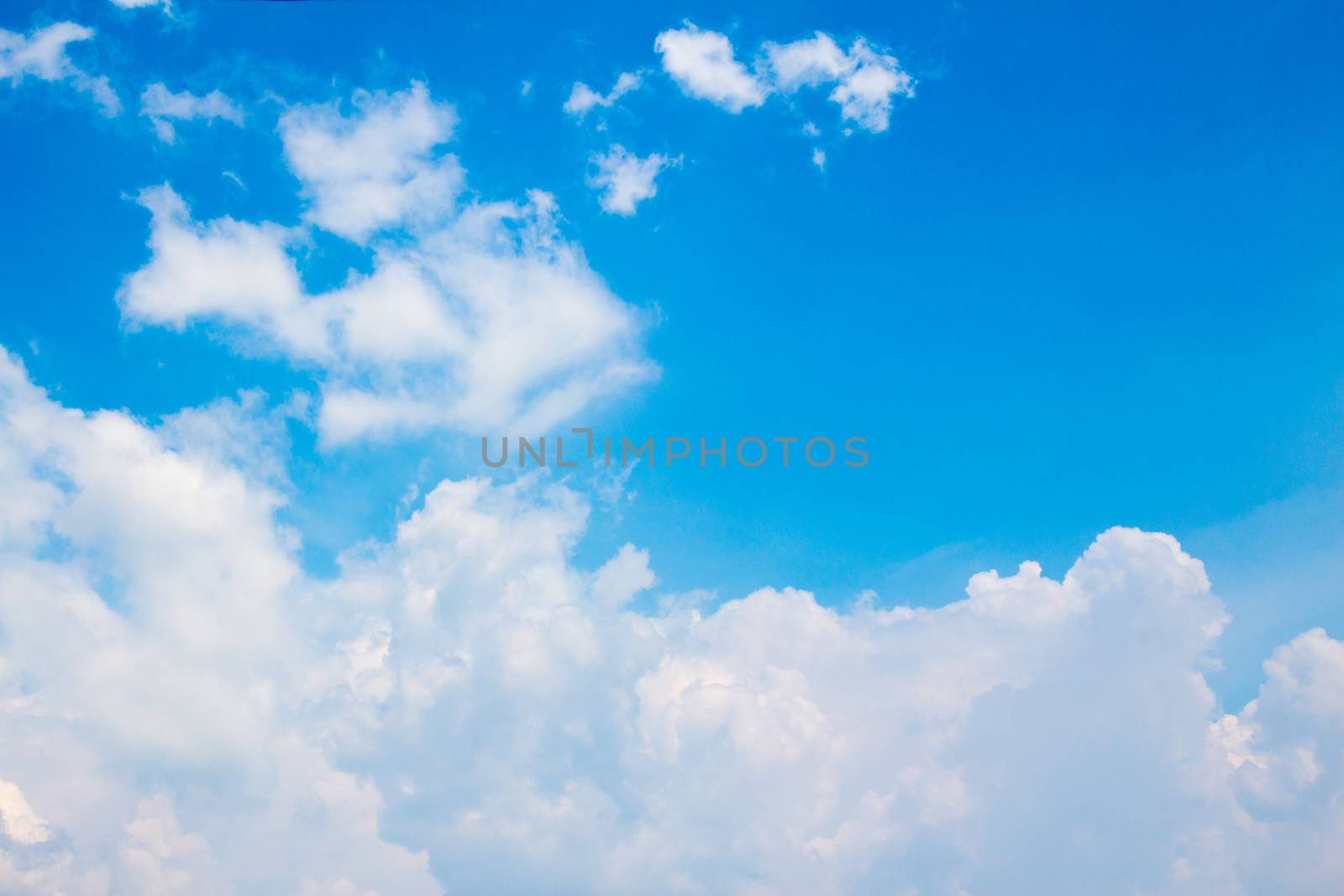 Blue sky with white thin cloud by peerapixs