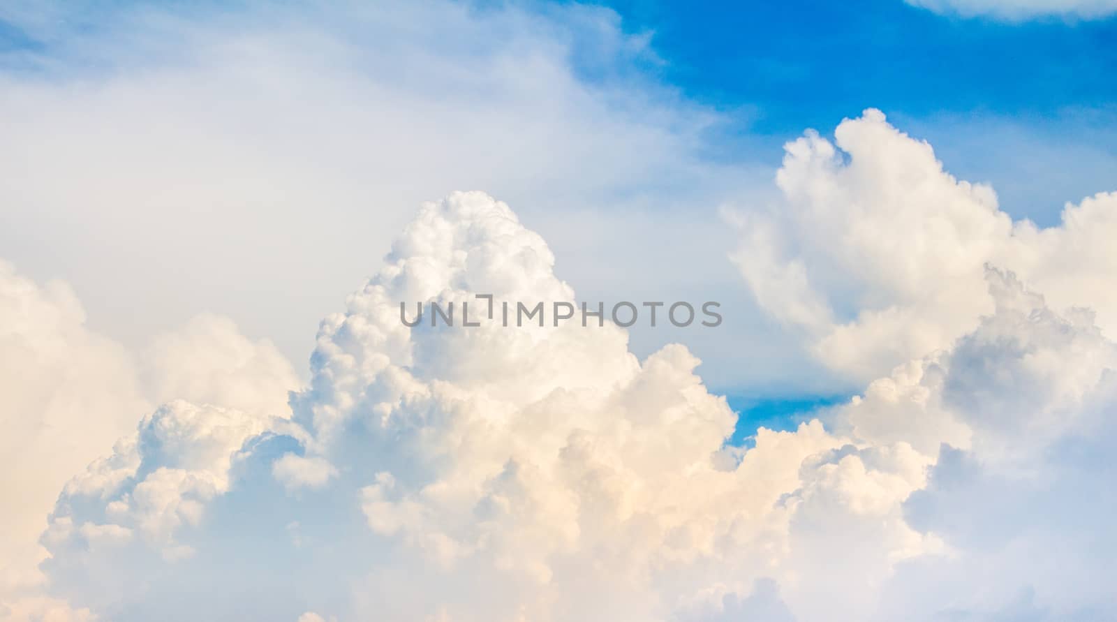 The white cloud on the blue sky by peerapixs