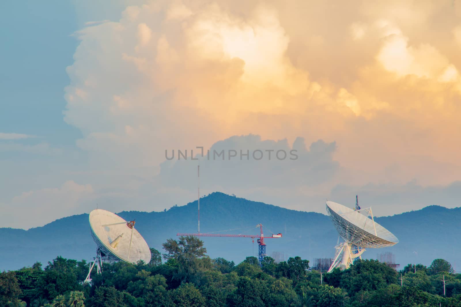 The gold sky with the gold cloud and two big satellite by peerapixs