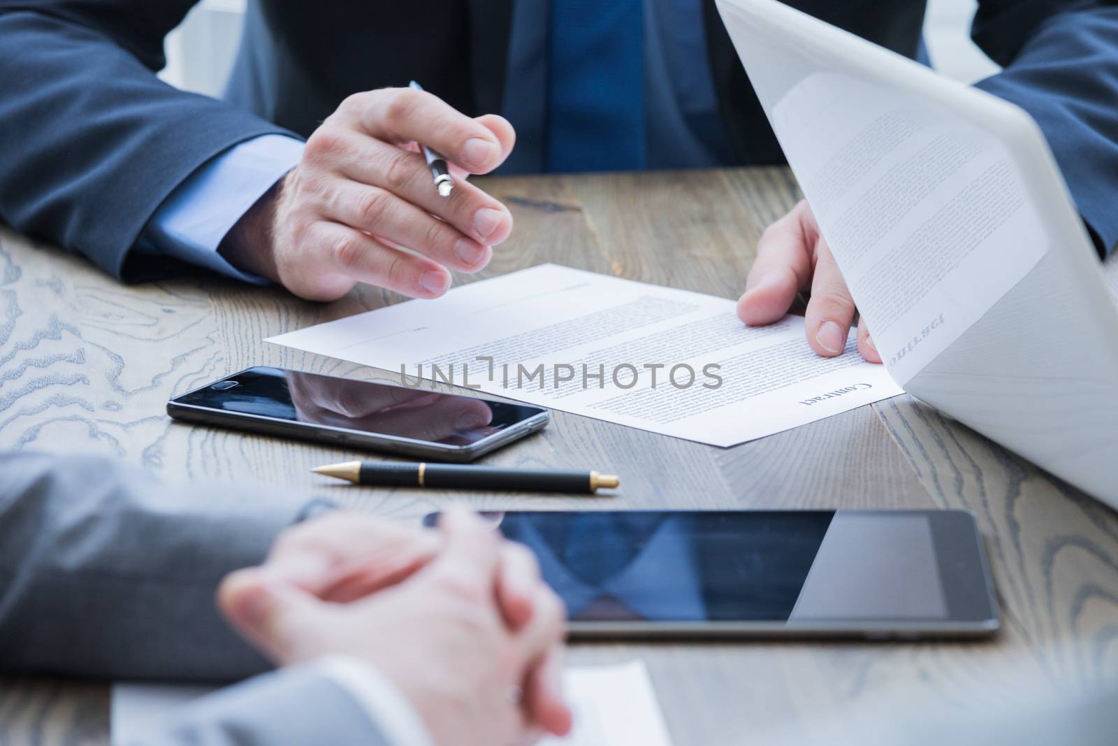 Business man sign contract on the desk at meeting