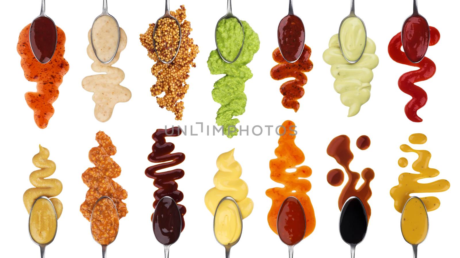 Set of different sauces with spoons isolated on white background with clipping path