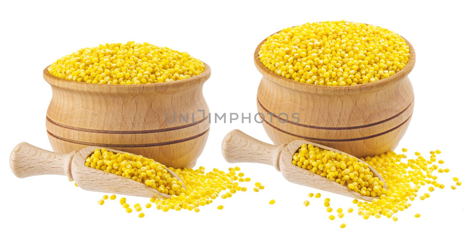 Isolated millet seeds. Wooden bowl and scoop with millet groats on white background. Close-up by xamtiw