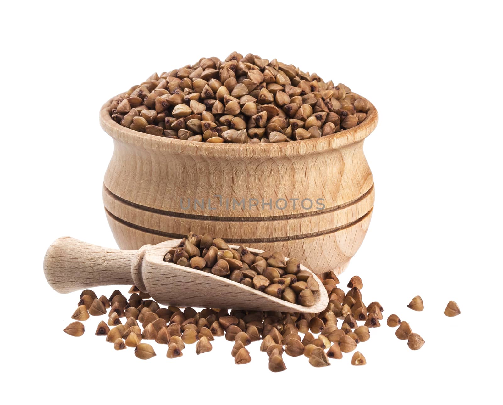 Buckwheat in wooden bowl isolated on white background with clipping path