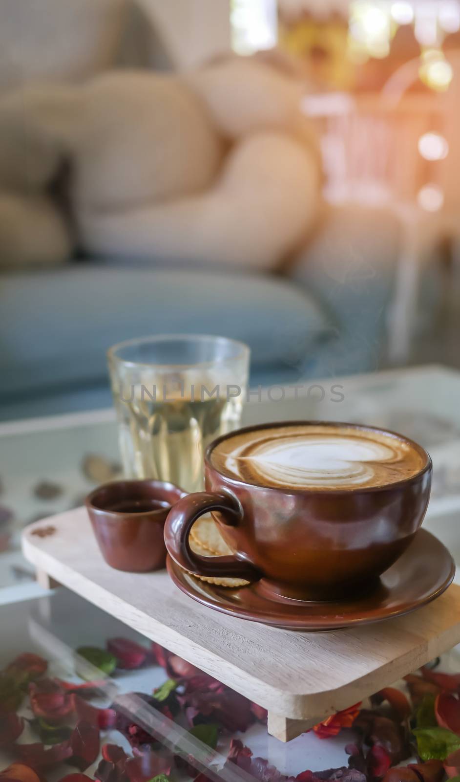 hot coffee cup and hot tea over wooden plate