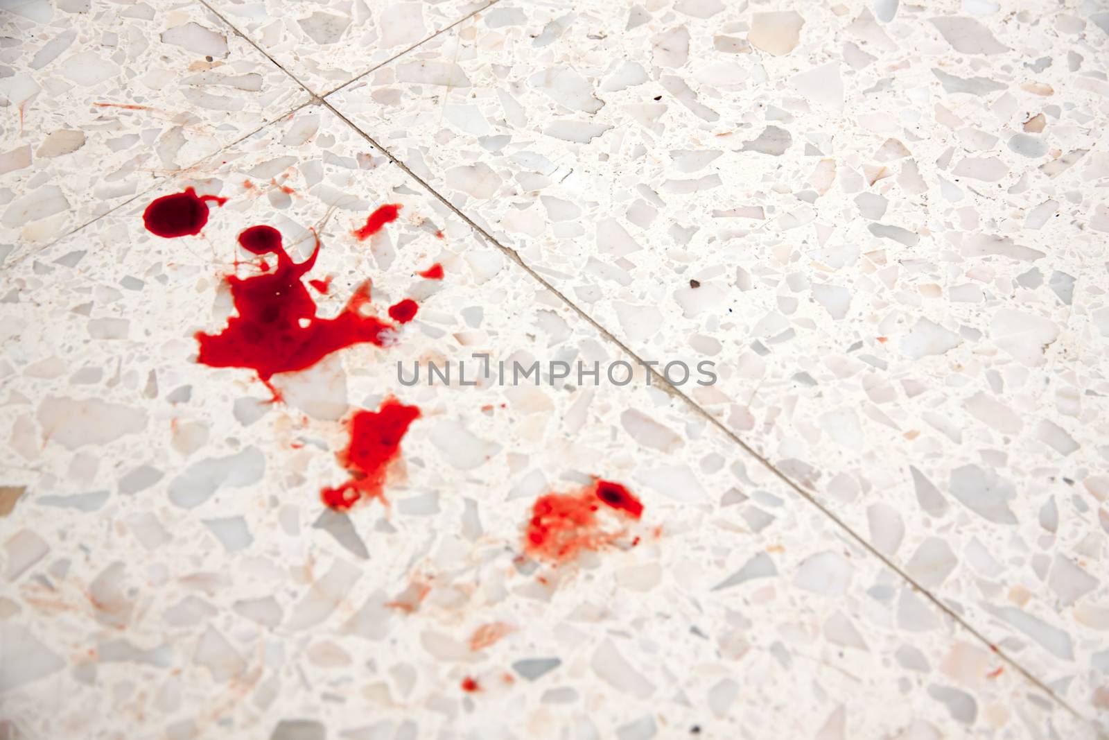 blood on the floor as symbol of crime and violence.