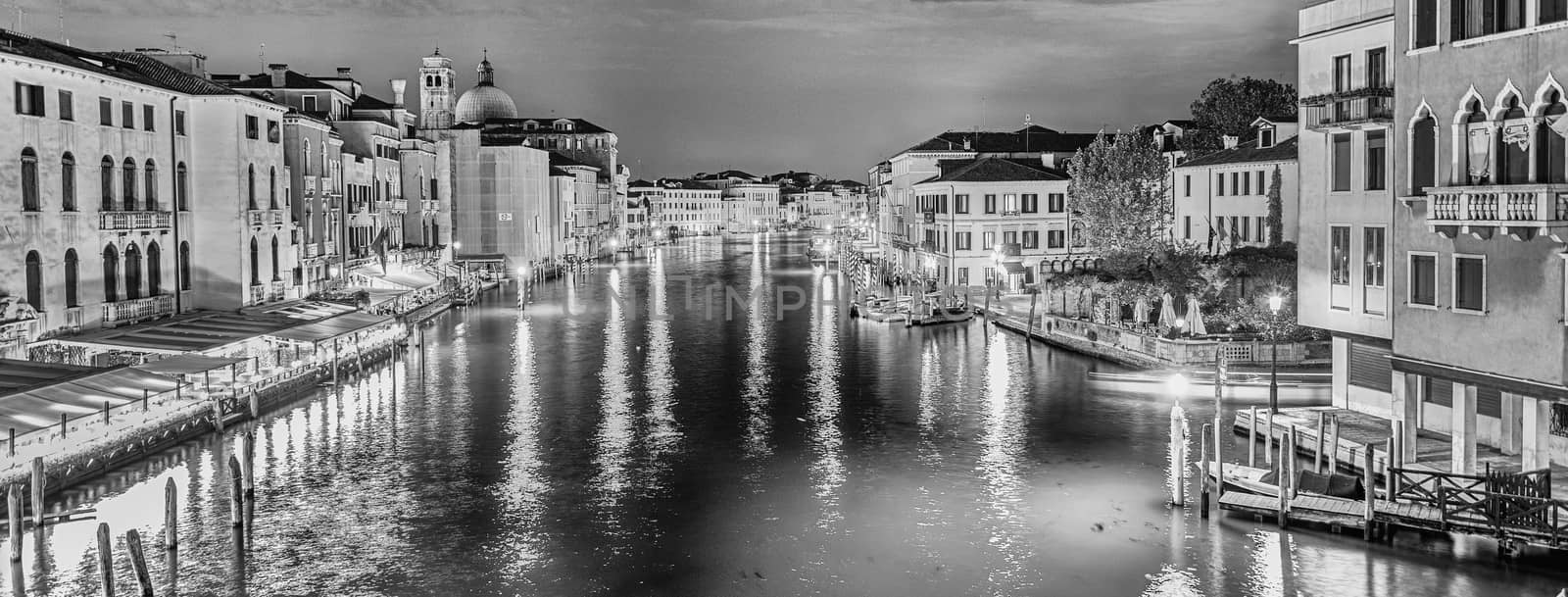 Scenic night view of the Grand Canal in Venice, Italy by marcorubino