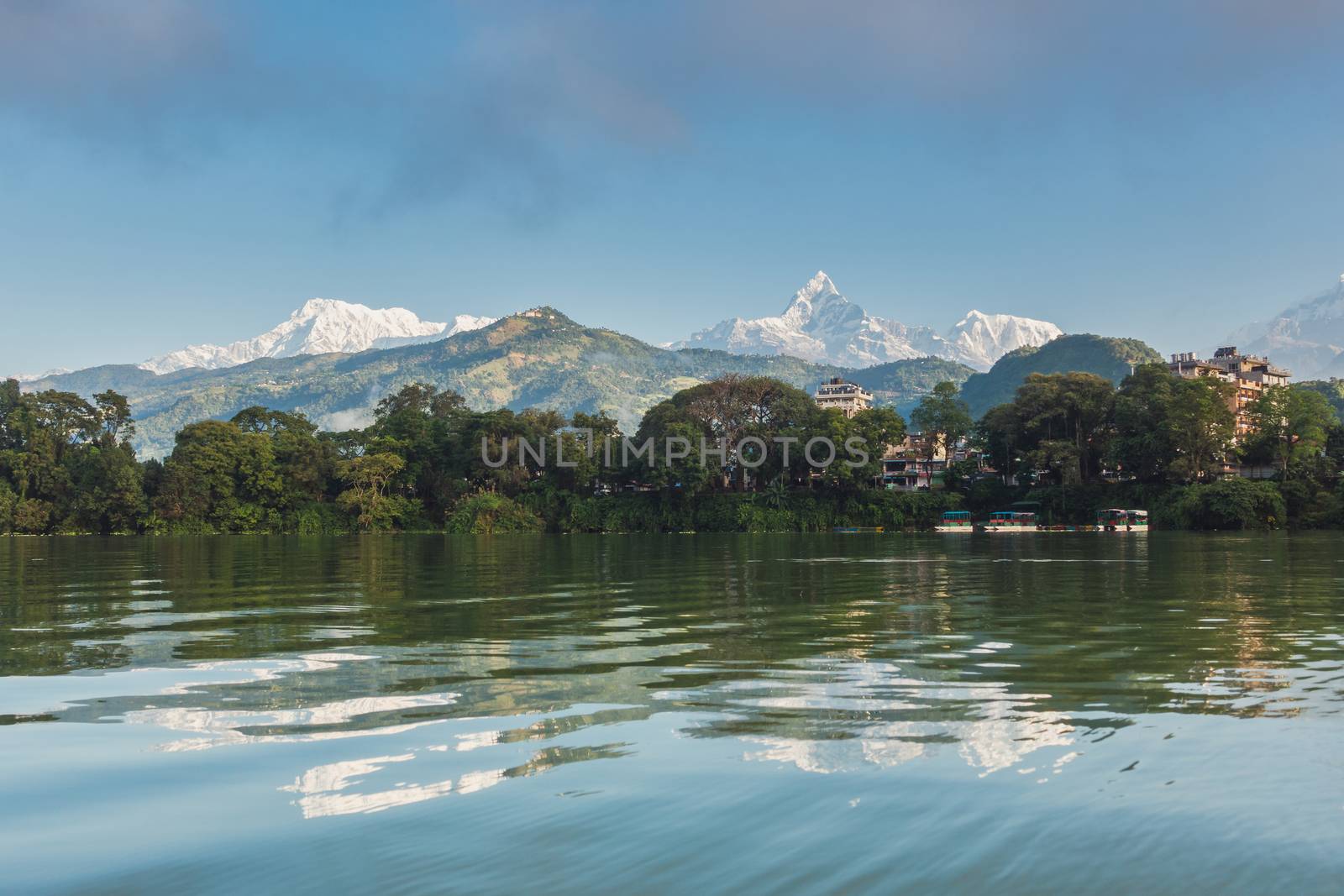 The Machapuchare and Annapurna range seen from Phewa Lake in Pokhara, Nepal