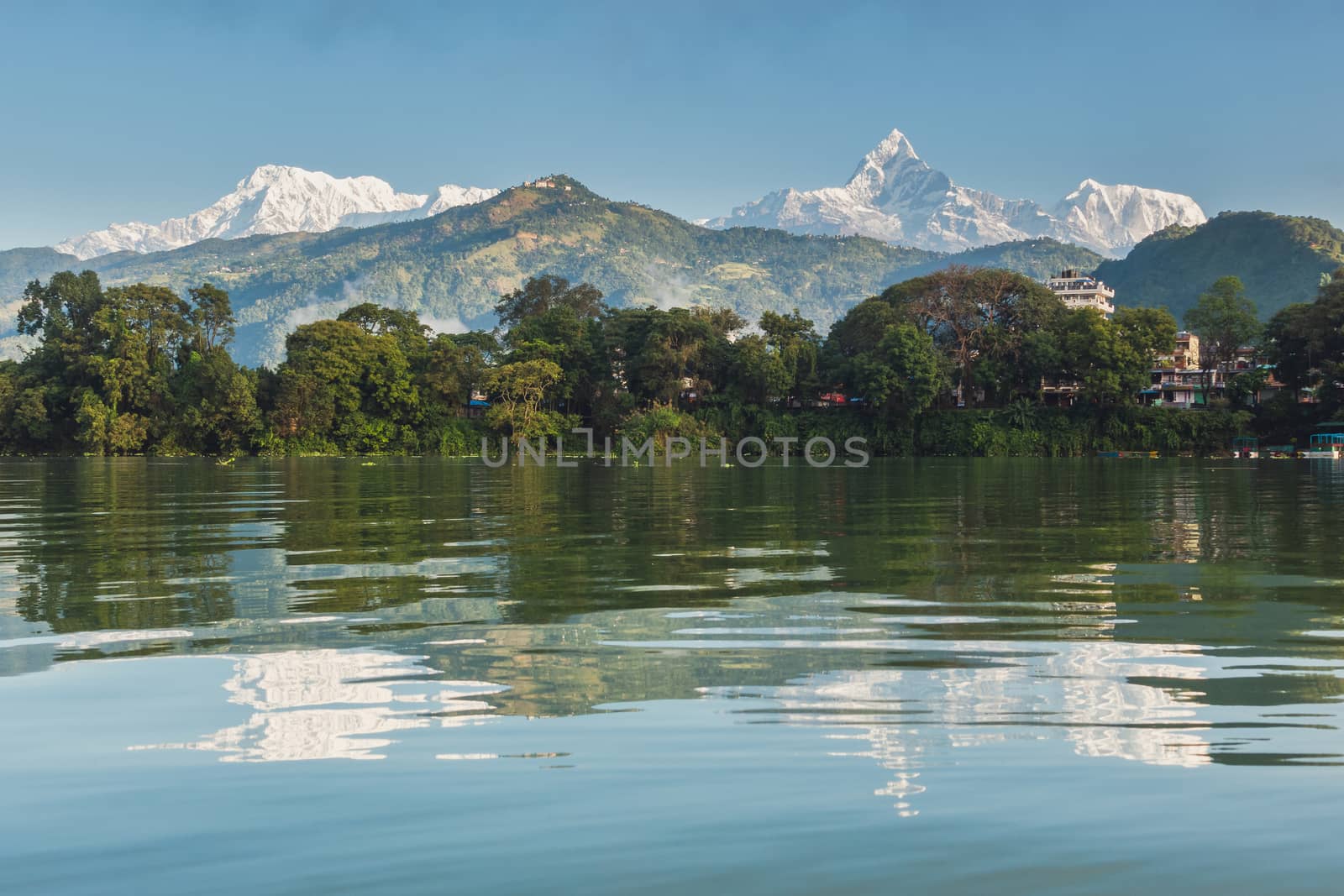 The Machapuchare and Annapurna range seen from Phewa Lake in Pokhara, Nepal