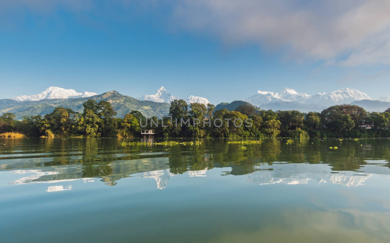 The Machapuchare and Annapurna range seen from Phewa Lake in Pokhara, Nepal