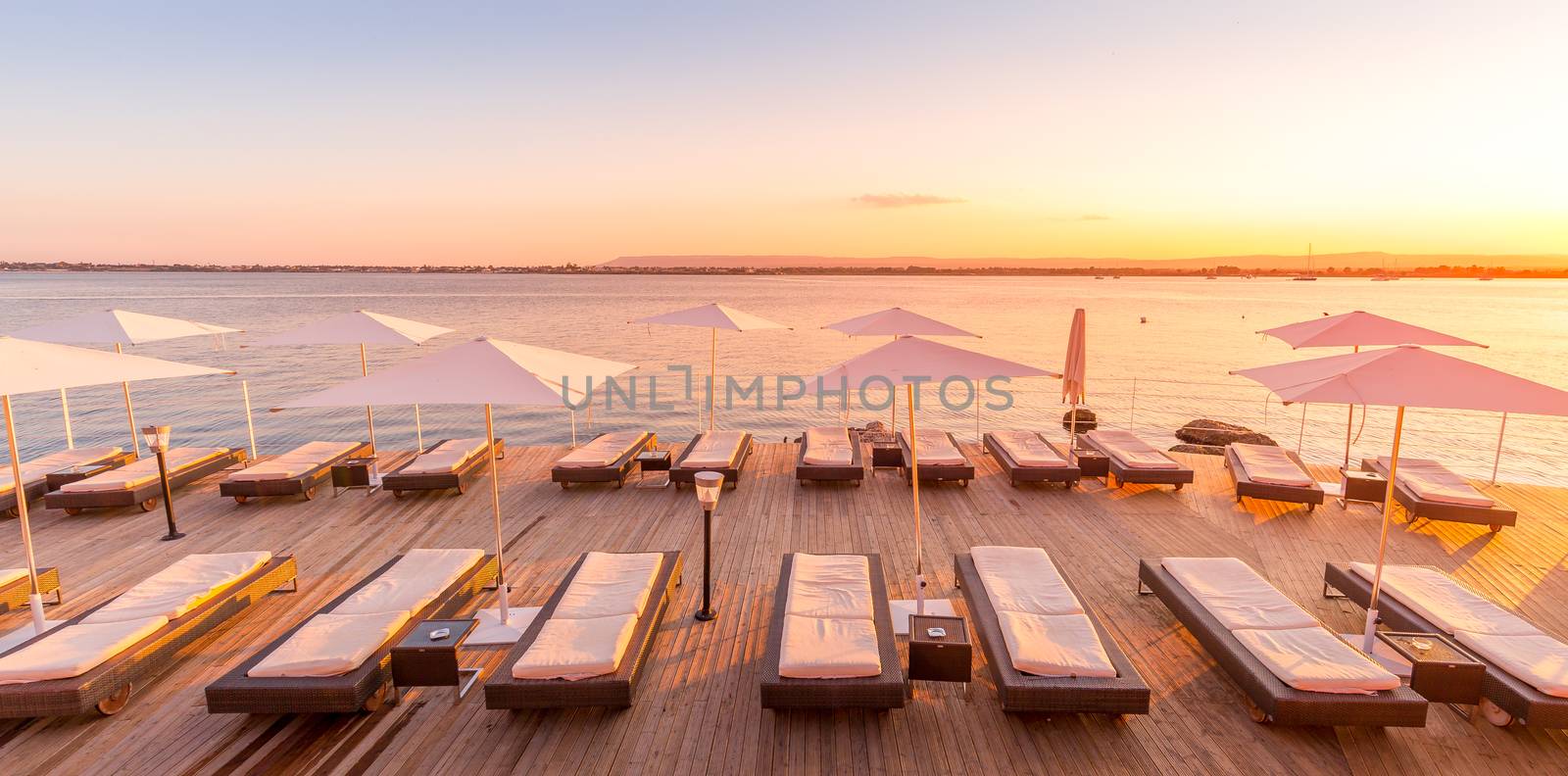 SYRACUSE, ITALY - sunset in front of the sea by Perseomedusa