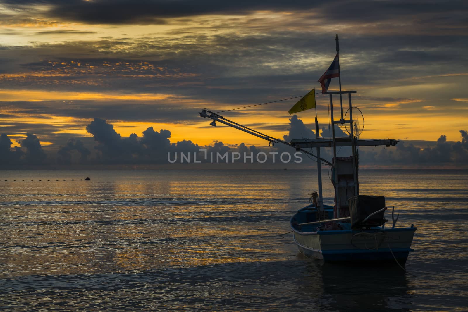 A fisherman boat in dawn by hongee