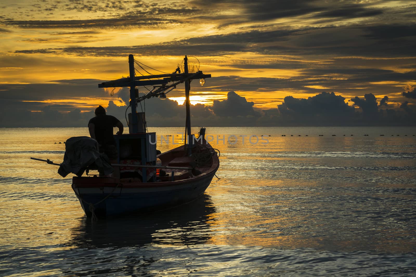 A fisherman boat in dawn ready to work.