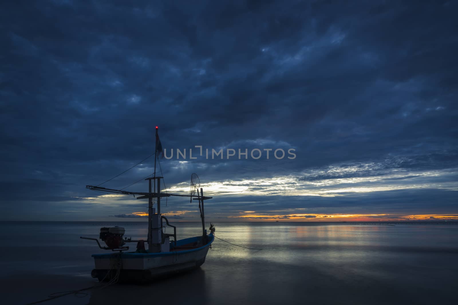 Fish boat rest on a for work in dawn by hongee