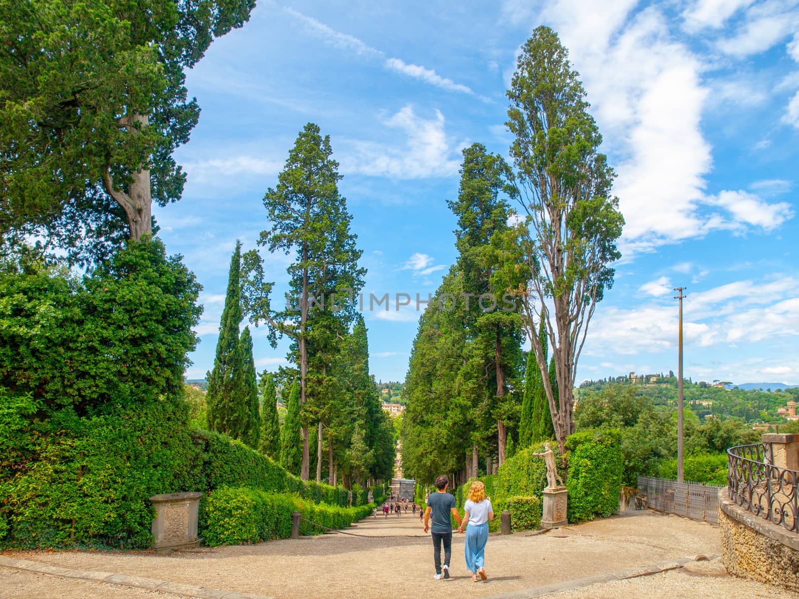 Young romantic pair in Boboli Gardens in Florence, Tuscany, Italy.