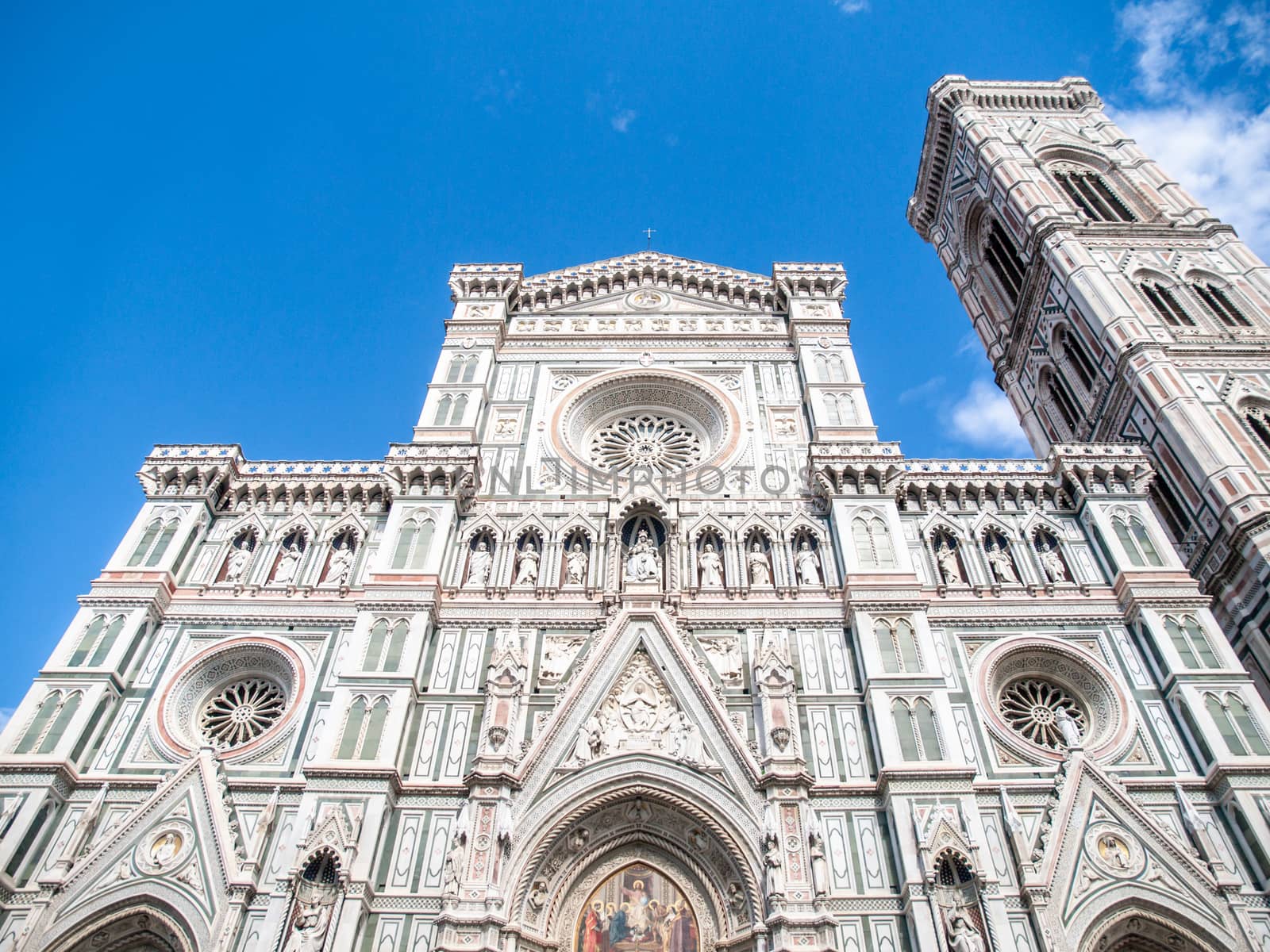 Main portal of Florence Catherdal, Cattedrale di Santa Maria del Fiore or Il Duomo di Firenze, with ornamental mosaic, Firenze, Tuscany, Italy.