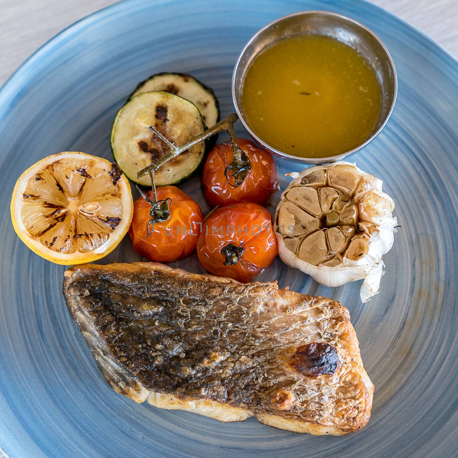 Grilled seabass fish  with grilled vegetable
