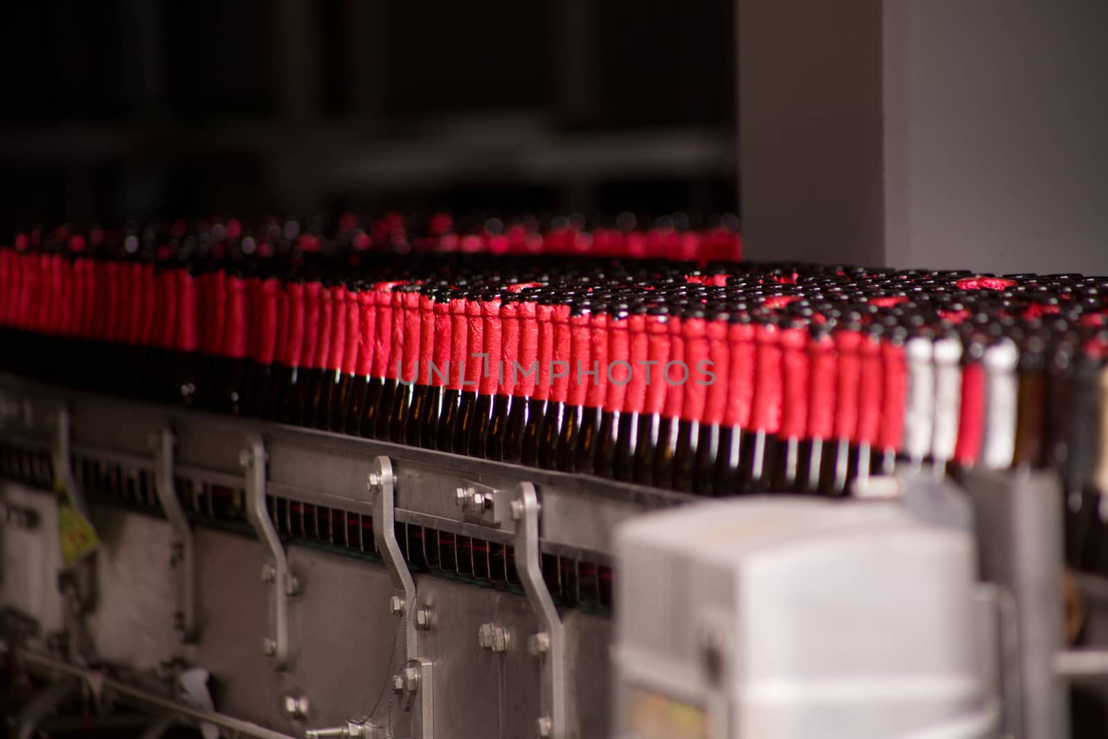 A group of empty beer bottles in a brewery