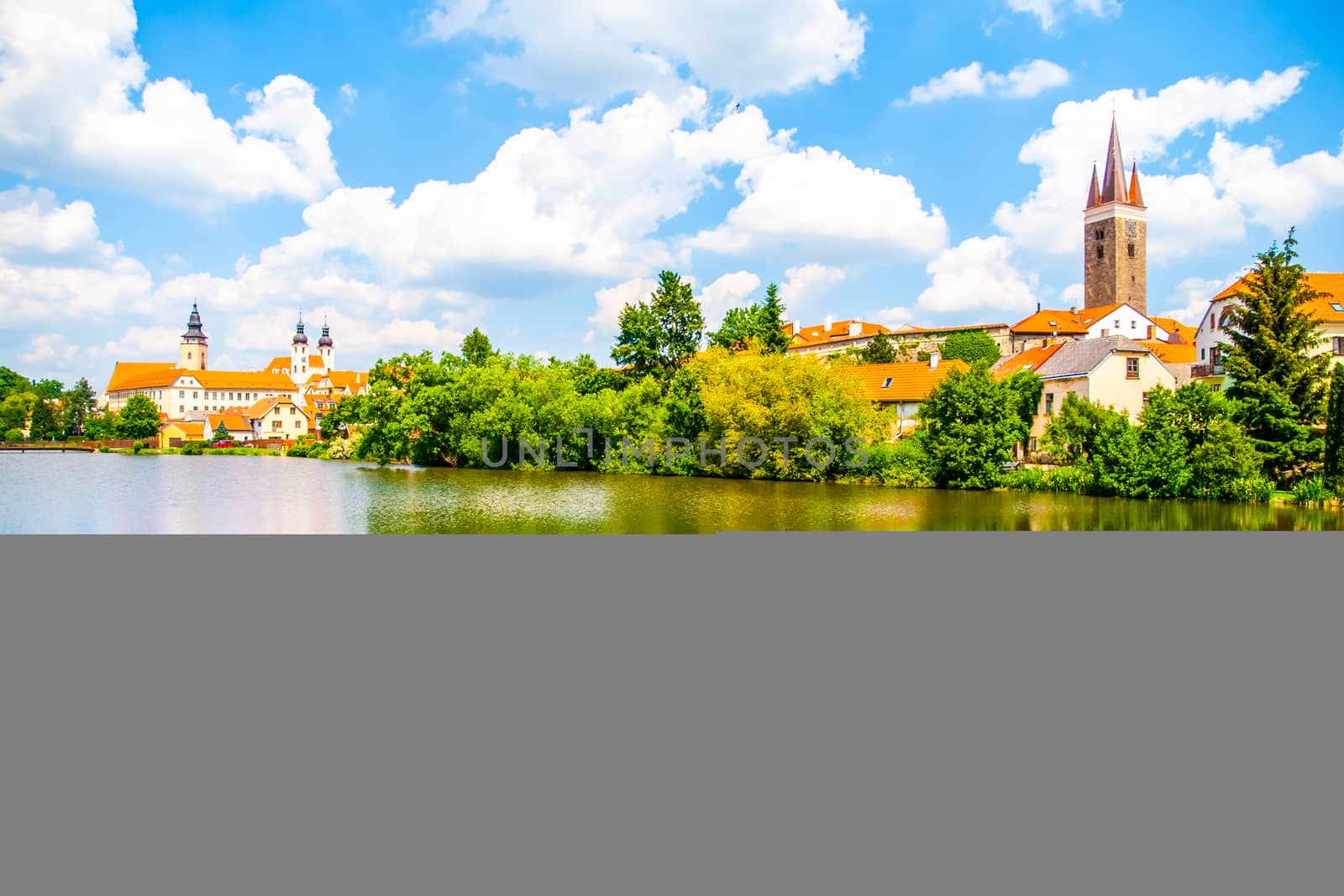 Panoramic view of Telc historical center. Water reflection, Czech Republic. UNESCO World Heritage Site..