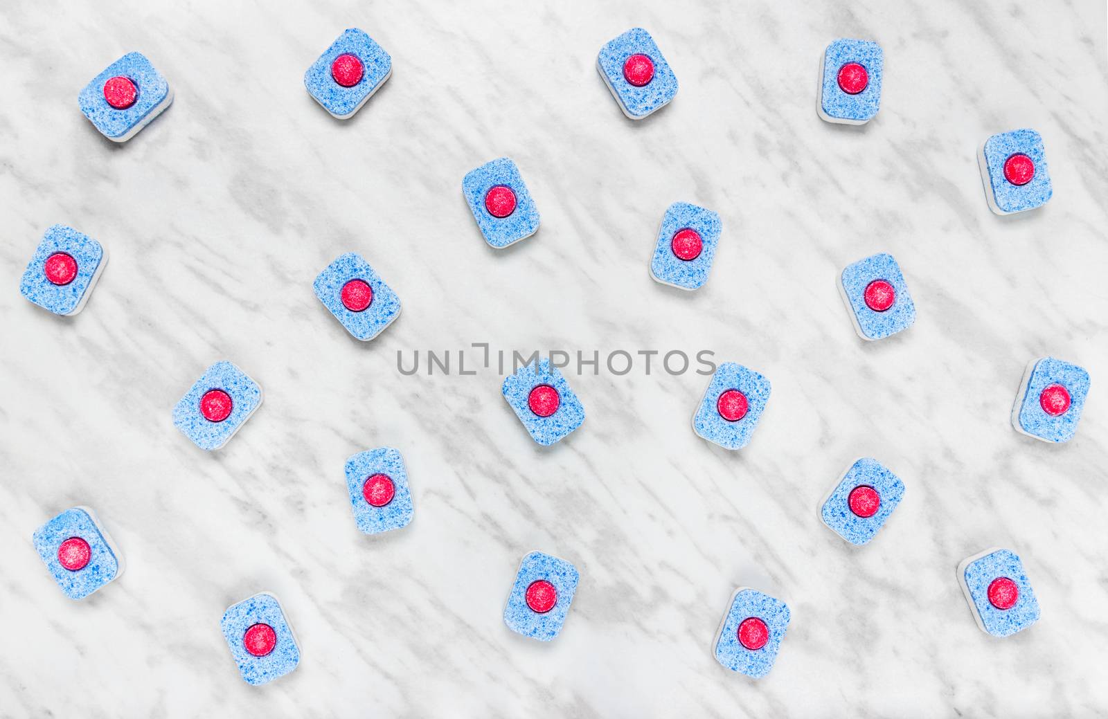 Dishwasher detergent tablets on marble background by anikasalsera