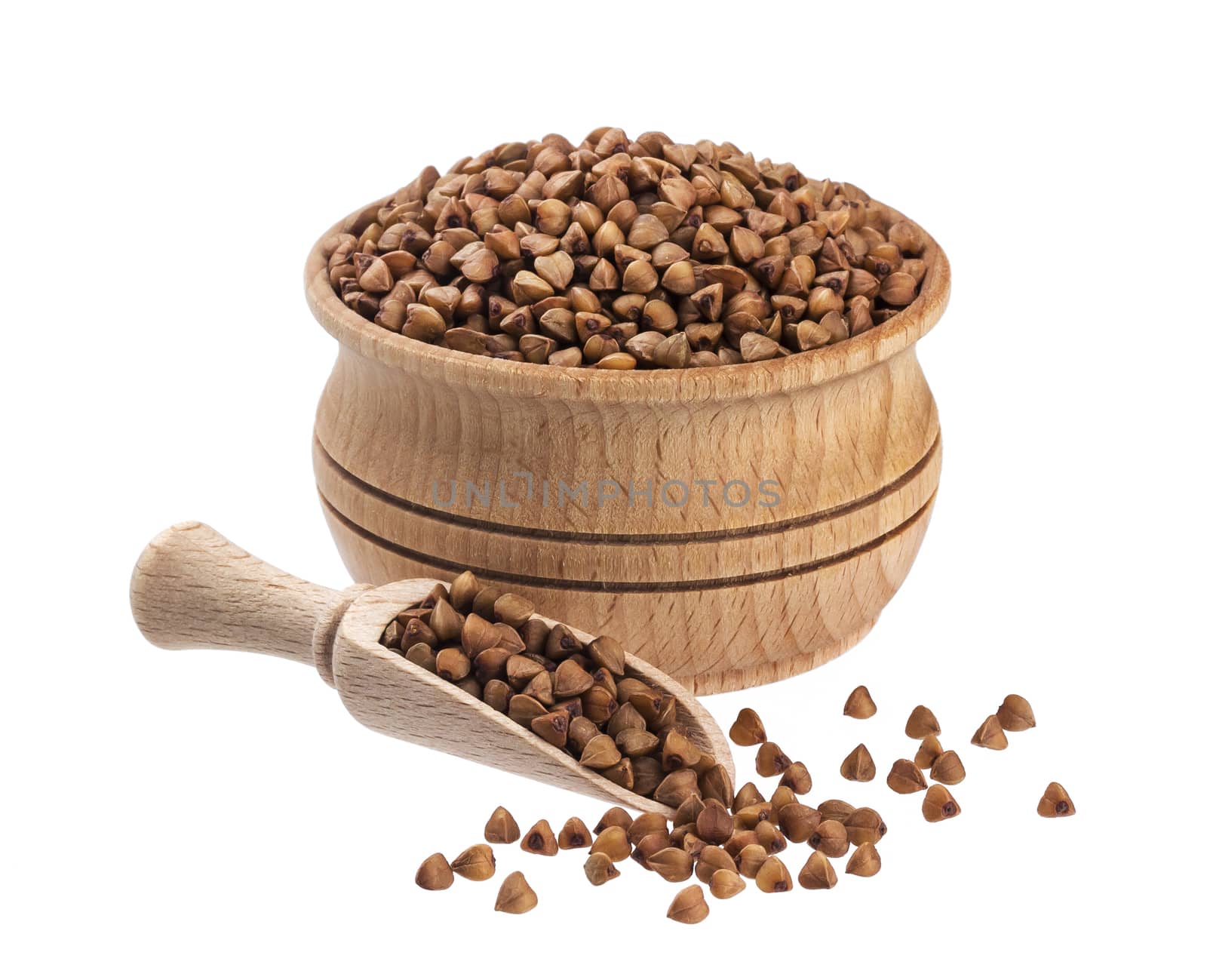 Buckwheat in wooden bowl isolated on white background with clipping path
