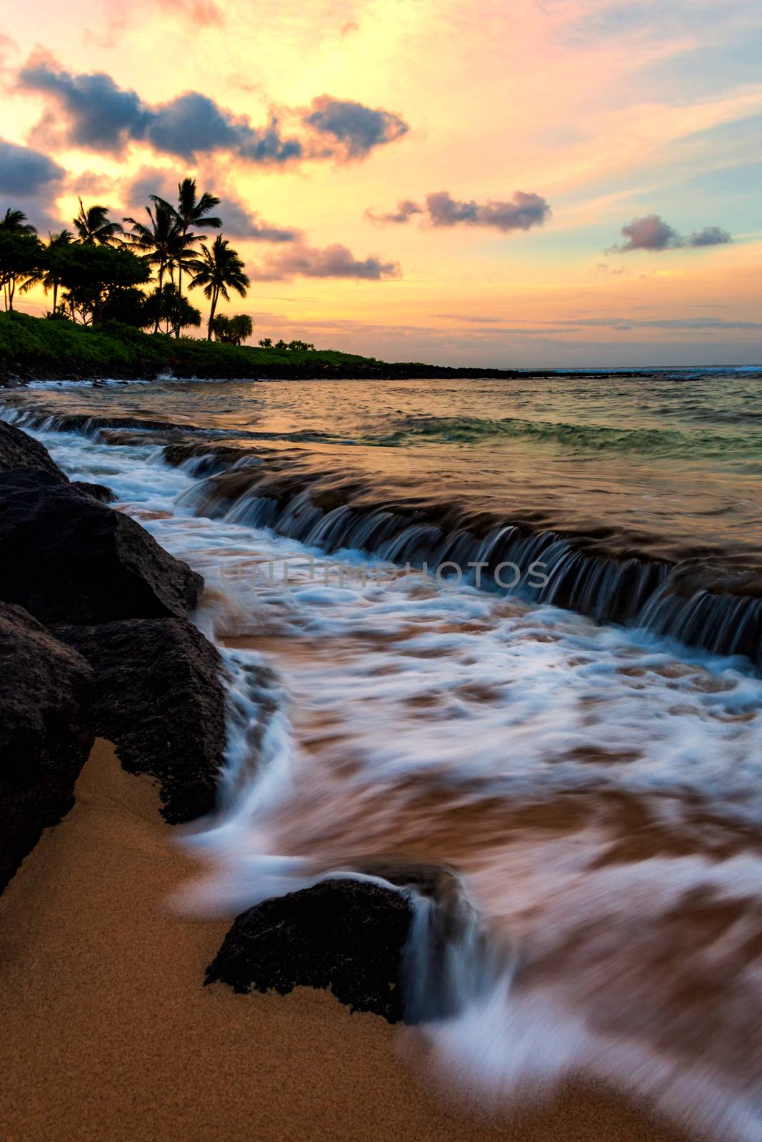 A dramatic sunset looking over the Pacific Ocean. Kauai, Hawaii.