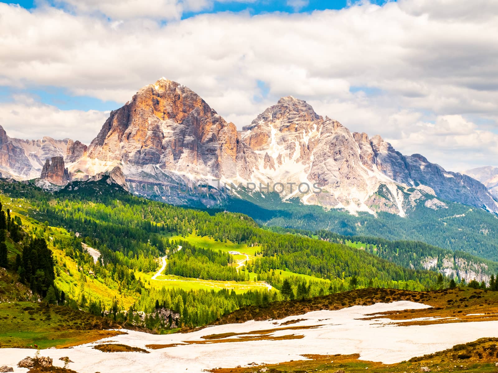 Cinque Torri rock towers and Tofana Mountains on sunny summer day, Dolomites, Italy.