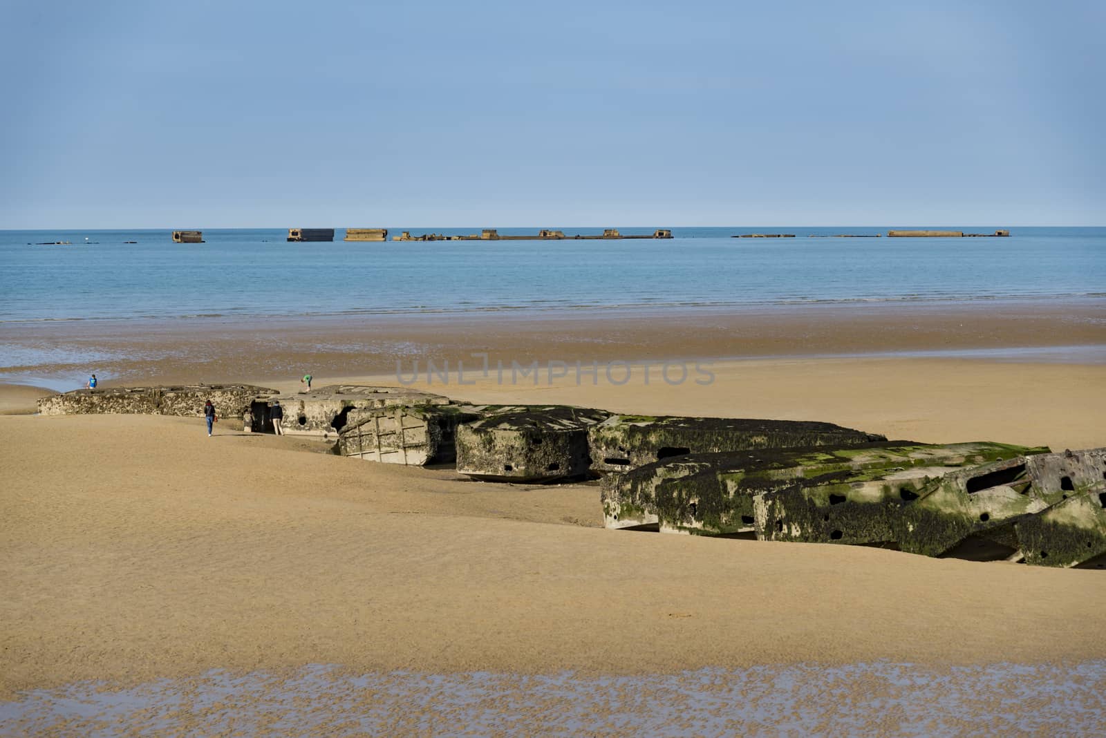 The remains of the Mulberry Harbour at Arromanches, Normandy France