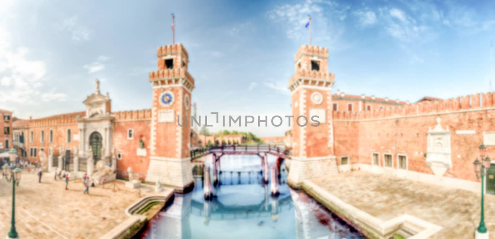 Defocused background with entrance to the Venetian Arsenal, Venice, Italy. Intentionally blurred for bokeh effect