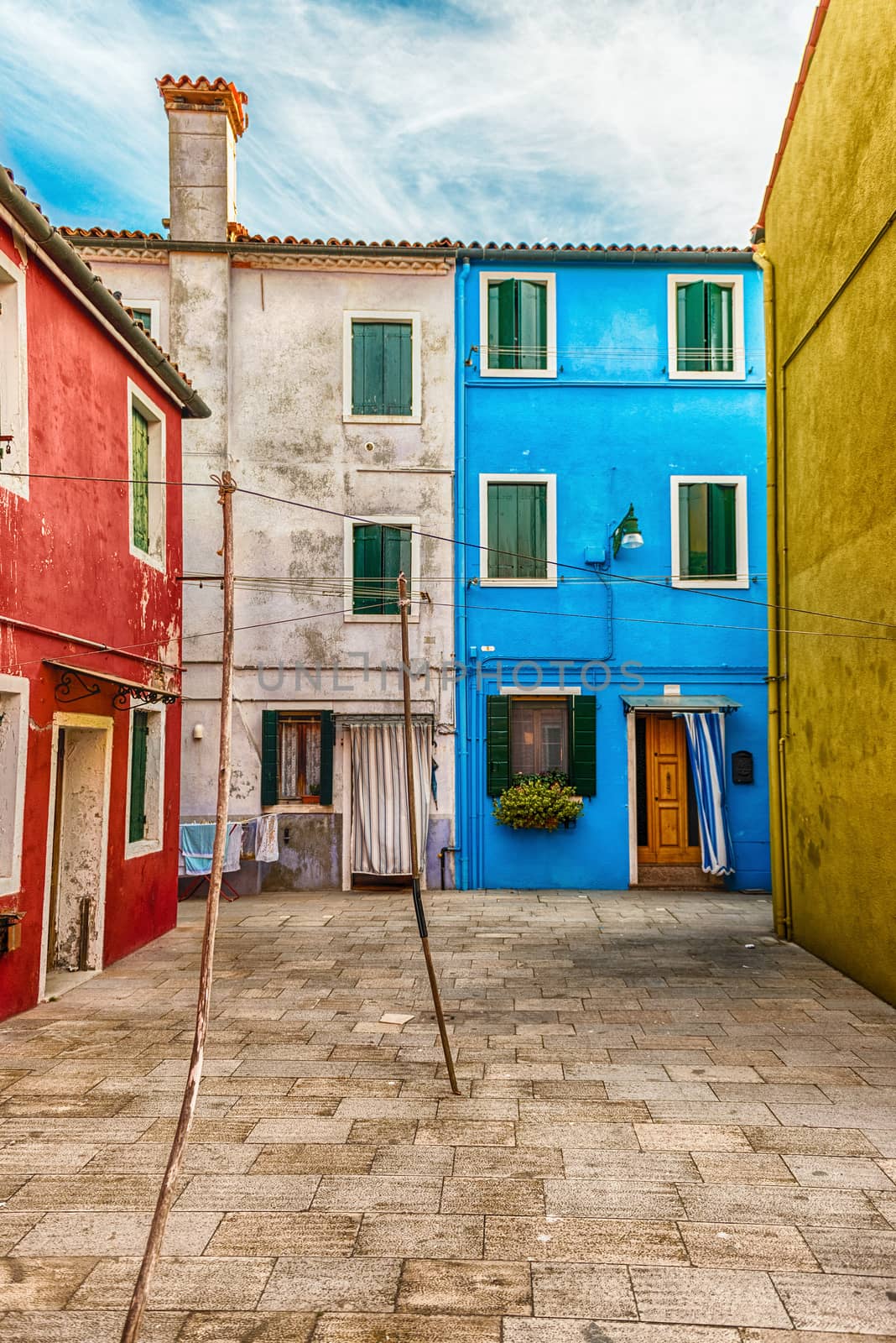 Colorful painted houses on the island of Burano, Venice, Italy by marcorubino