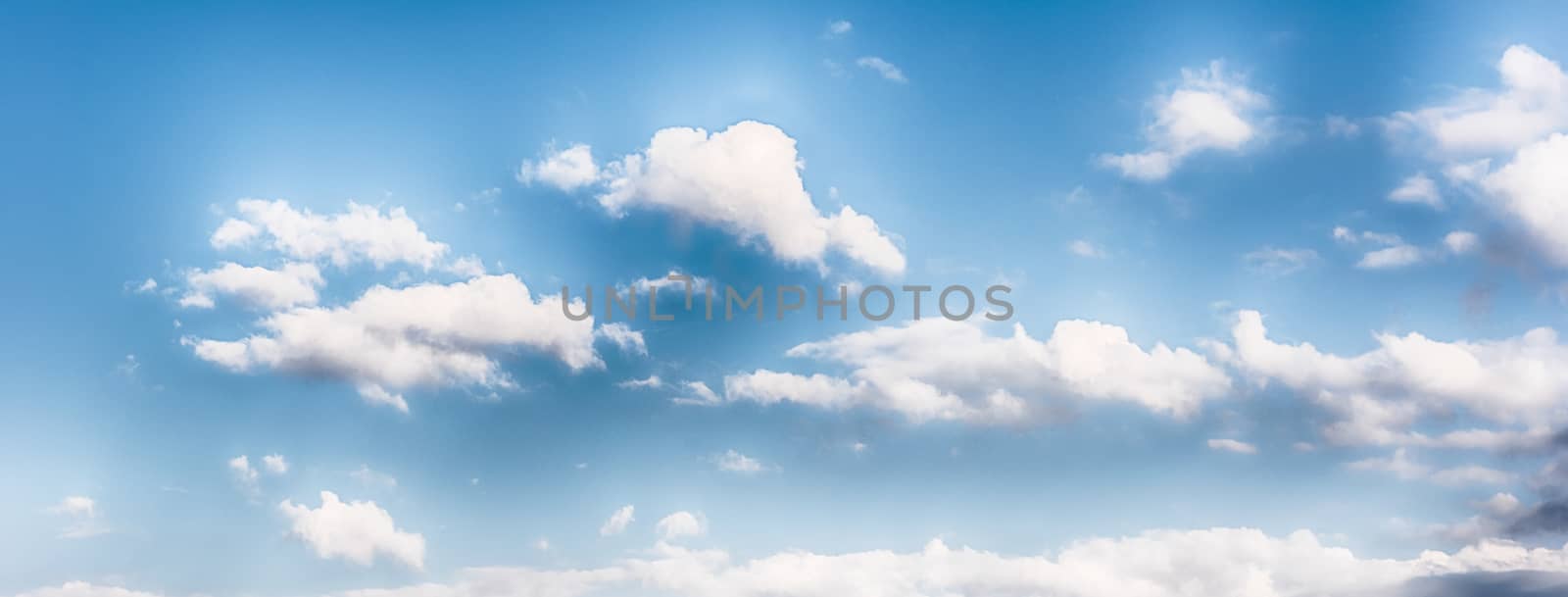 Blue sky with scenic clouds texture, useful as background by marcorubino