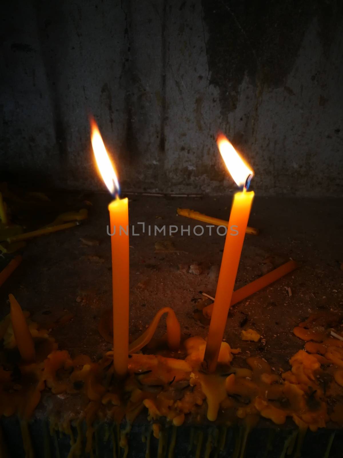 Incense and candlelight for worship from Buddhist in Thailand Te by shatchaya