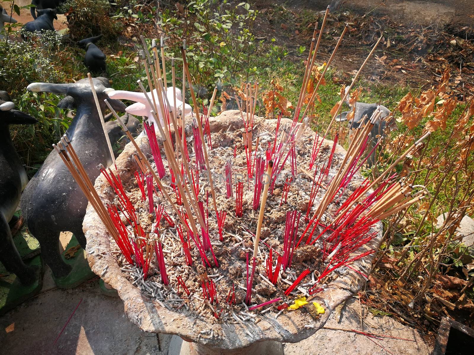 incense and candles  for Buddha statue to pray gods in Thailand Temples