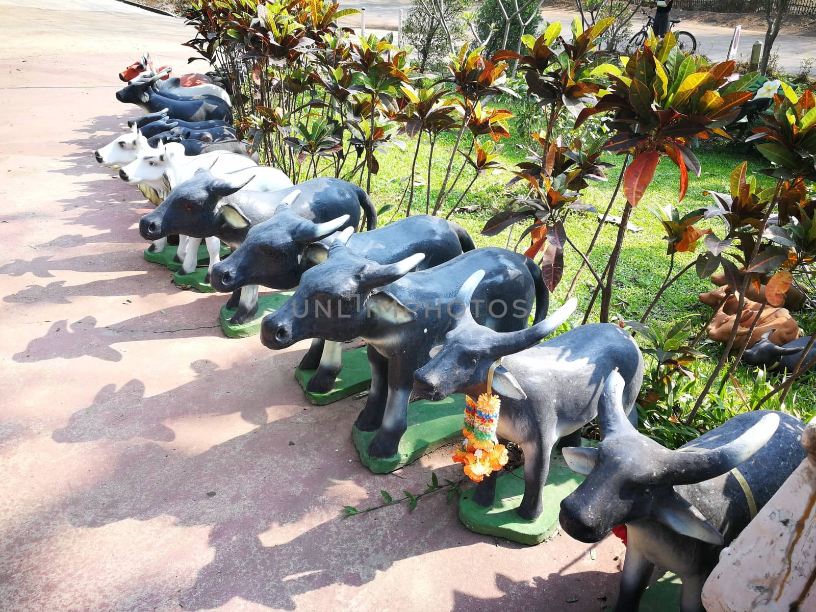 Thailand animals of ceramic dolls  for Buddha statue and Thailand text were words to pray god