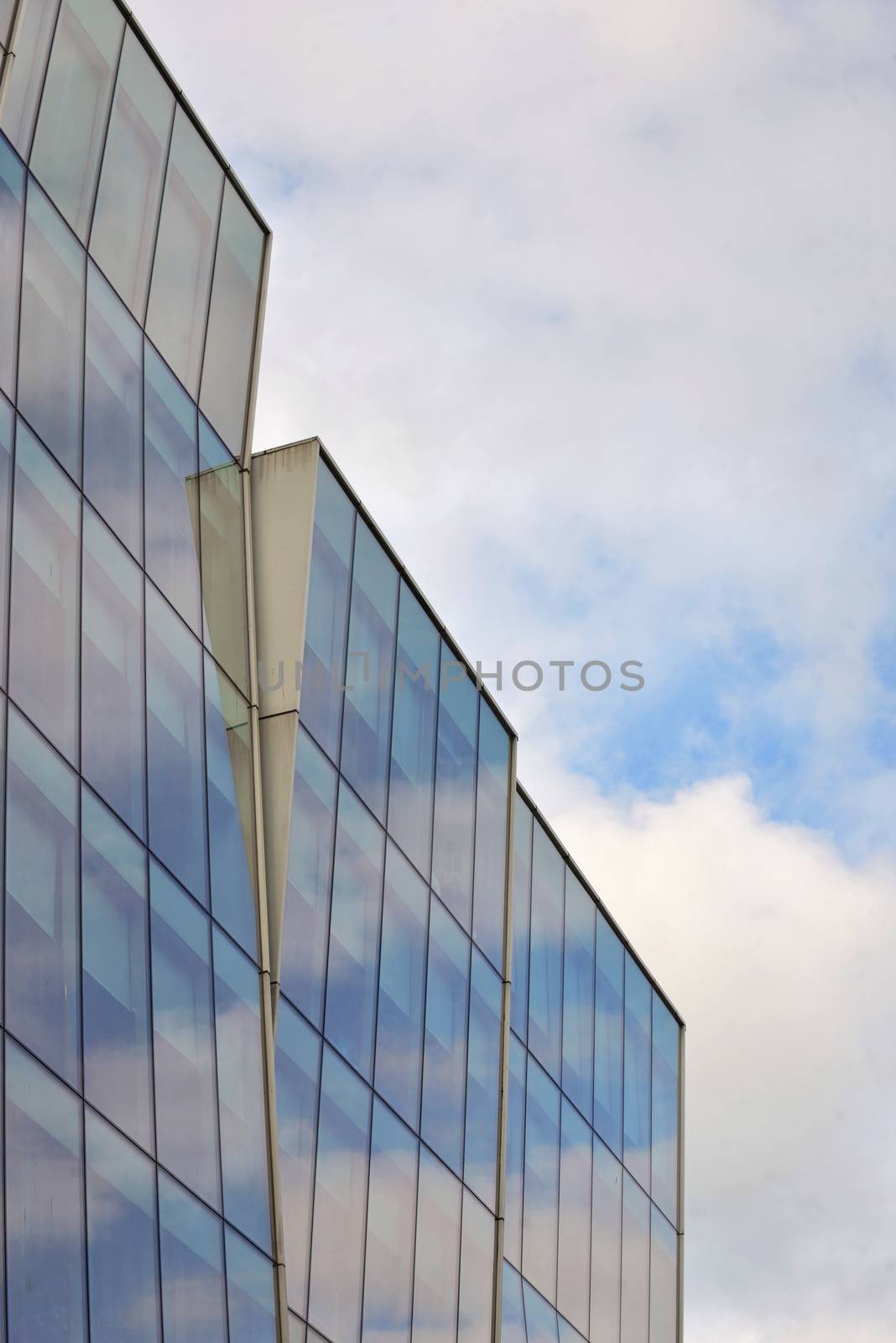 Glass facade of modern office building in the city