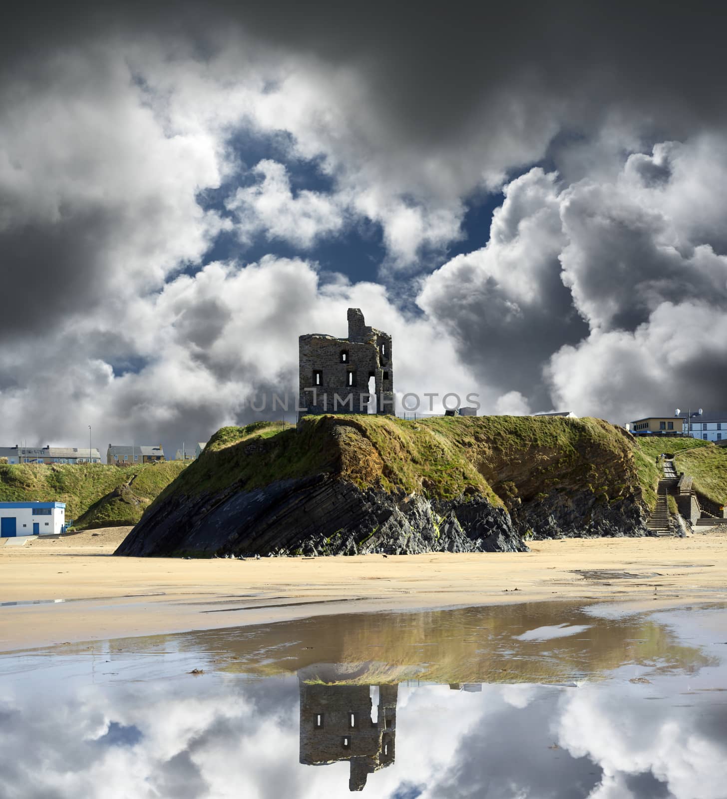 wild atlantic way castle ruins and beach by morrbyte
