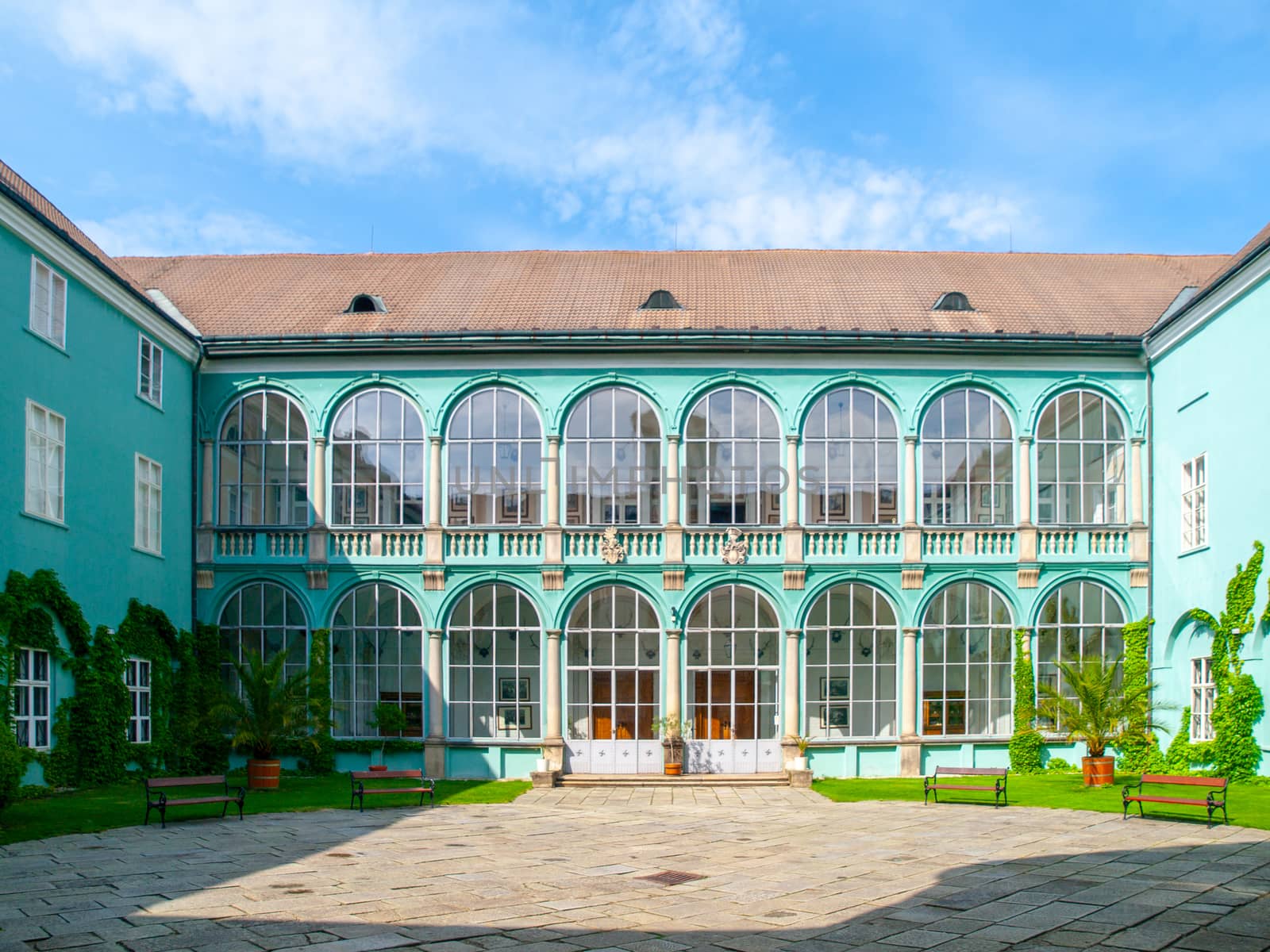 Courtyard with glazed windows of renaissance chateau in Dacice, Czech Republic.