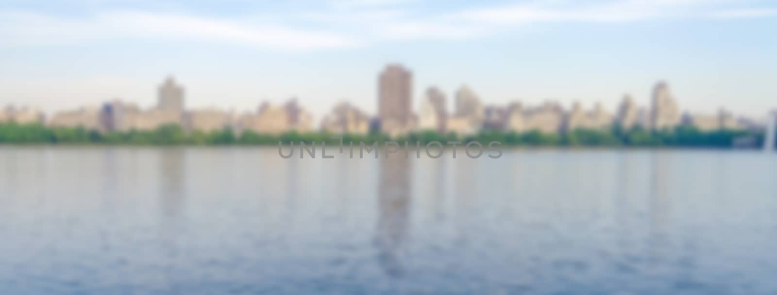 Defocused background with Reservoir in Central Park, New York City. Intentionally blurred post production for bokeh effect