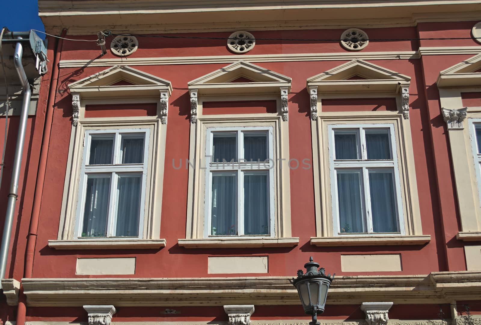 Windows on an old restored 19th century building by sheriffkule