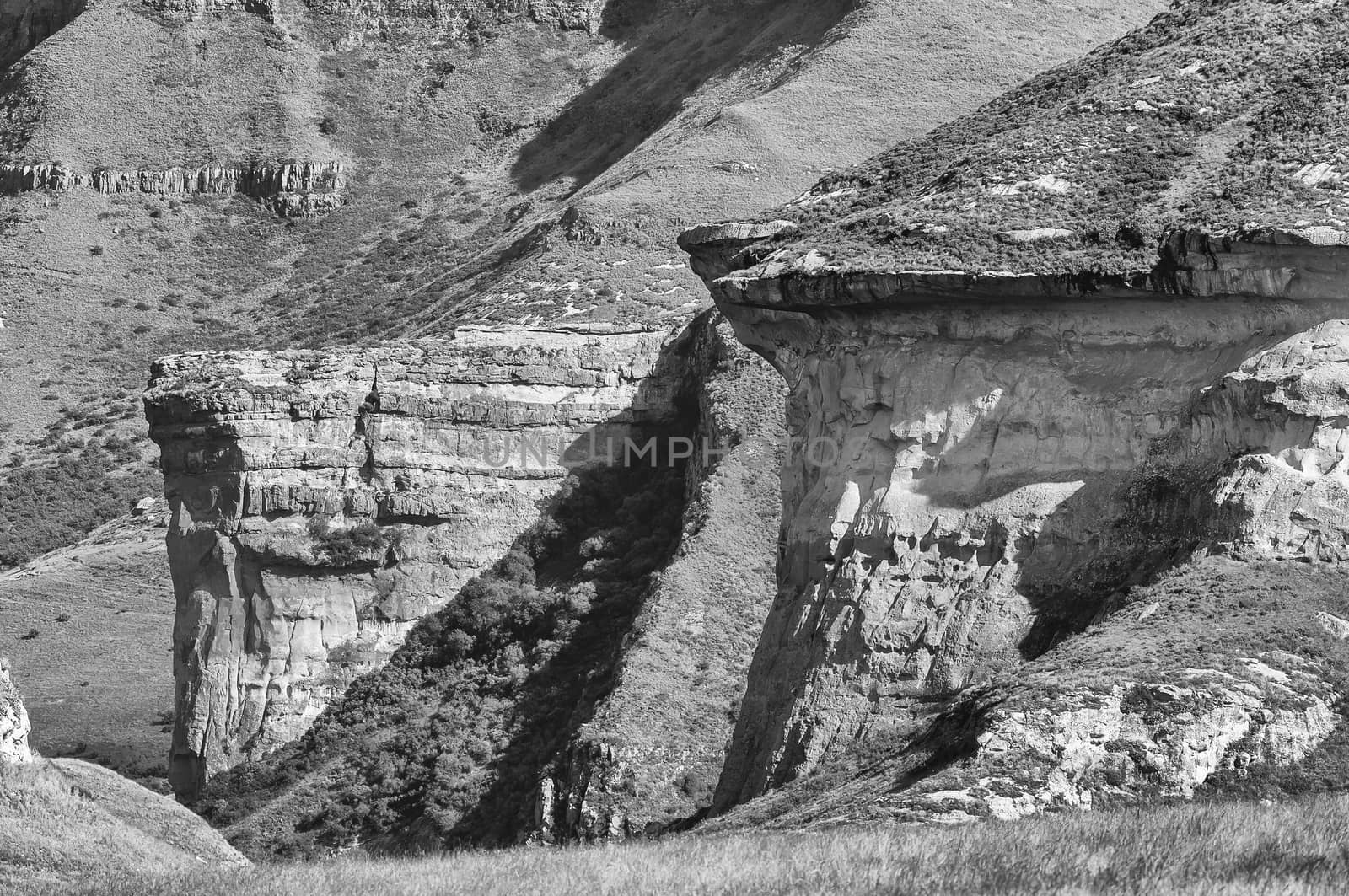 Monochrome view of the Brandwag and Mushroom Rock, two sandstone buttresses at Golden Gate in the Free State Province of South Africa