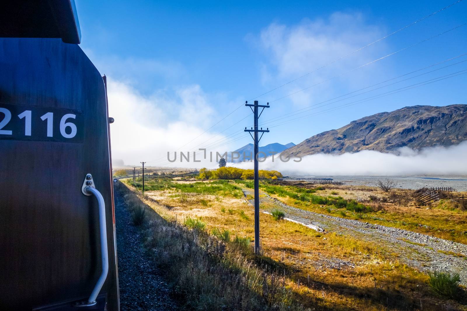 Train in Mountain fields landscape, New Zealand alps