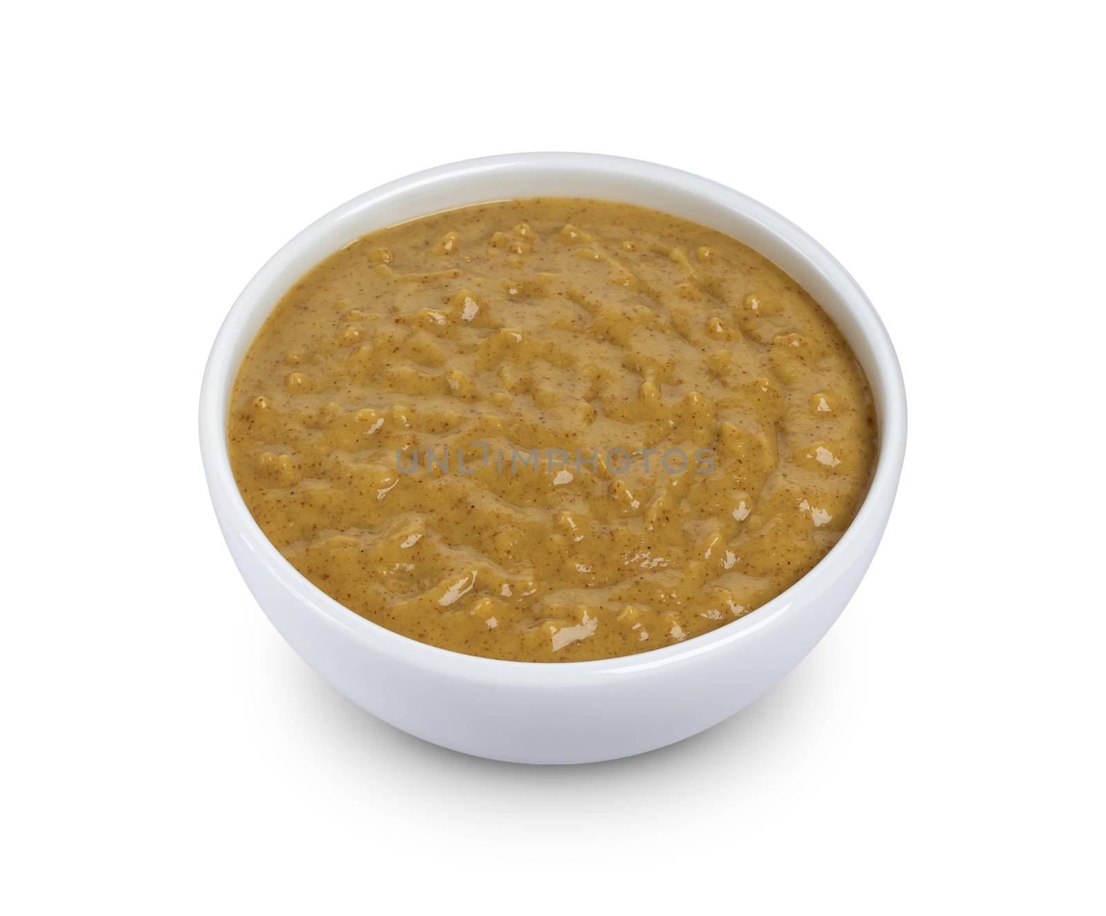 Mustard in bowl isolated on white background with clipping path