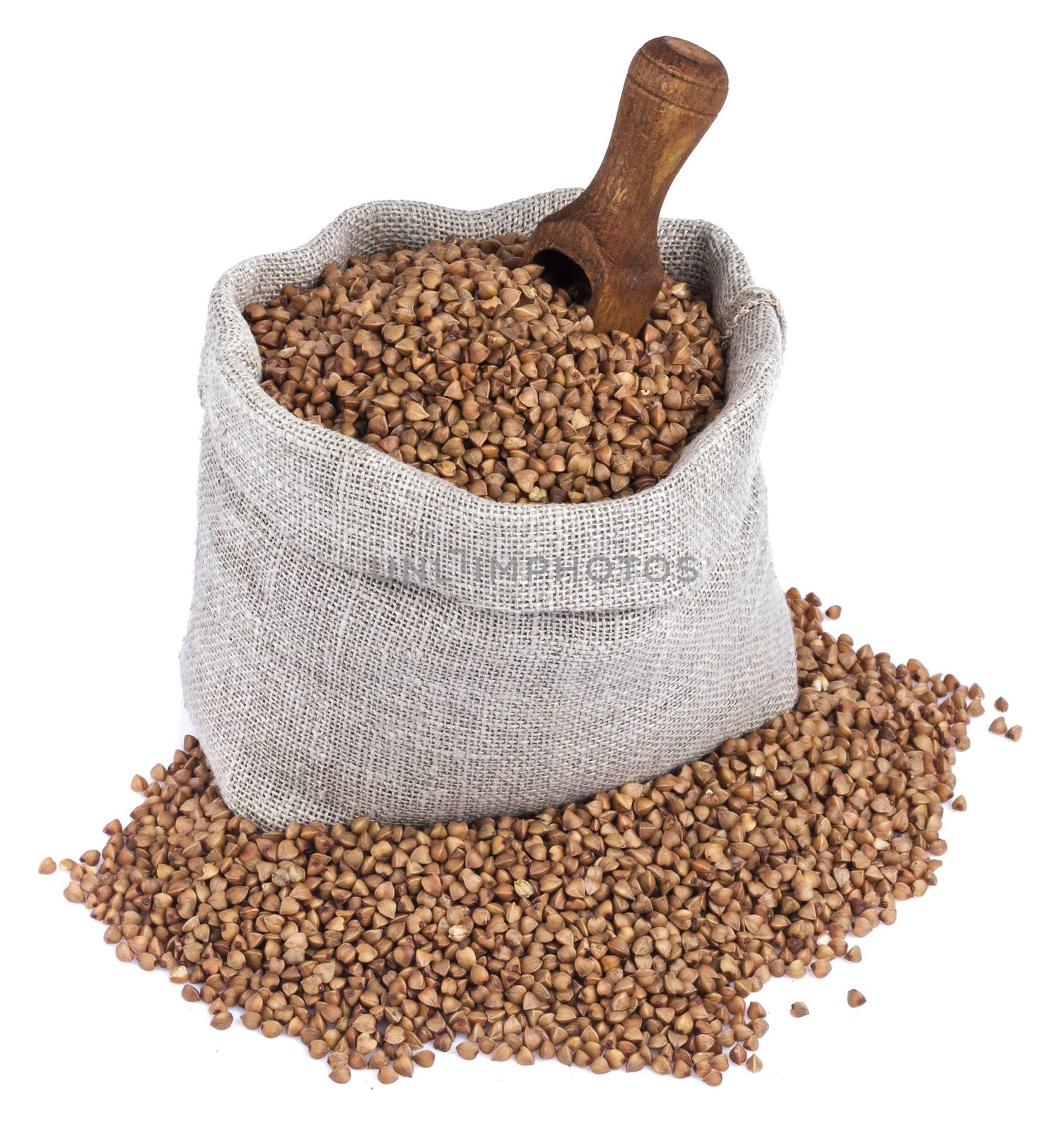 Buckwheat in bag isolated on white background with clipping path. Closeup